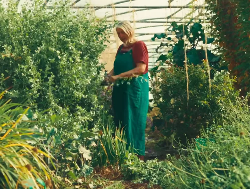 Mandy Barber tending to perennial vegetables